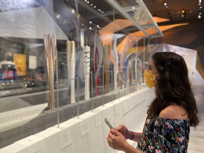Woman wearing mask at US Olympic & Paralympic Museum